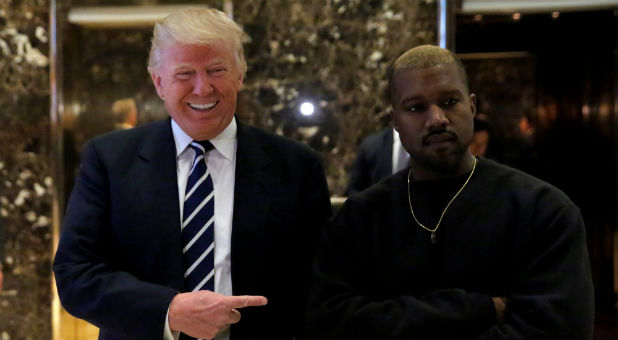 President-elect Donald Trump and Kanye West pose for media at Trump Tower in Manhattan.