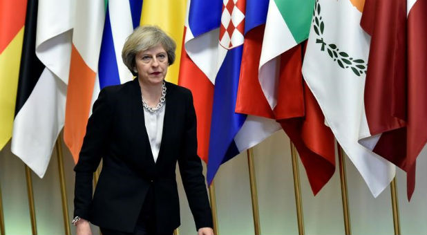 Britain's Prime Minister Theresa May leaves a EU Summit at the European Council headquarters in Brussels, Belgium