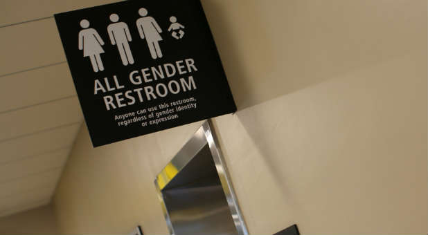 A sign for an all-gender restroom is shown at San Diego's international airport, Lindberg Field, in San Diego, California.