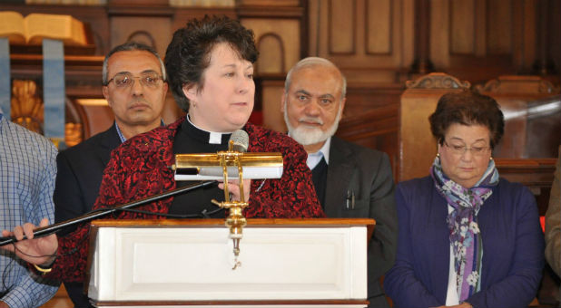 Rev. Sara Smith announces the details of the sale of United Congregational Church.