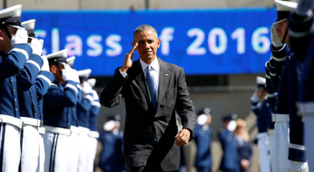 President Barack Obama acknowledges the crowd as he arrives to deliver his farewell address in Chicago, Illinois.