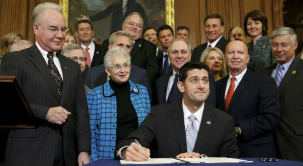 Ryan signs a bill at the U.S. Capitol in Washington, D.C.