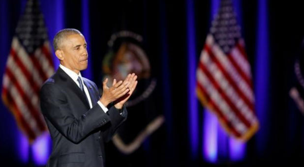 U.S. President Barack Obama claps after giving a farewell address at McCormick Place in Chicago