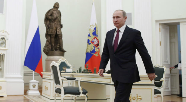 Russian President Vladimir Putin attends a meeting