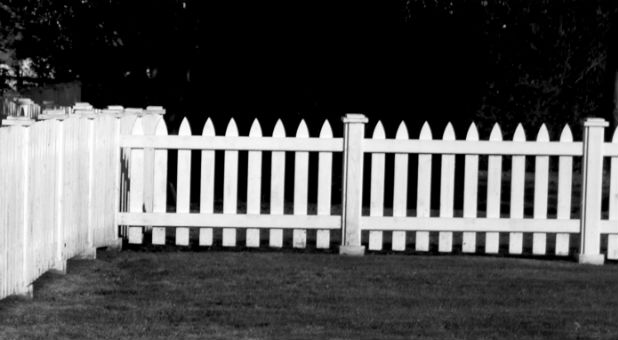A house with a white picket fence is an American dream staple.