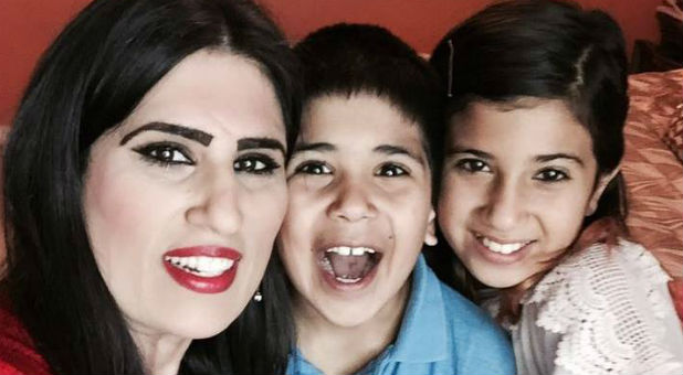 Naghmeh Abedini with her children.