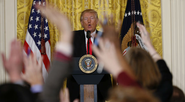 U.S. President Donald Trump takes questions from reporters during a lengthy news conference