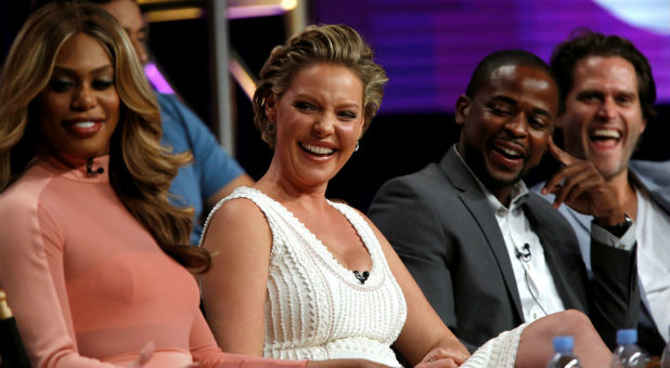 Cast members (L-R) Laverne Cox, Katherine Heigl, Dule Hill and Steven Pasquale smile at a panel for the television series