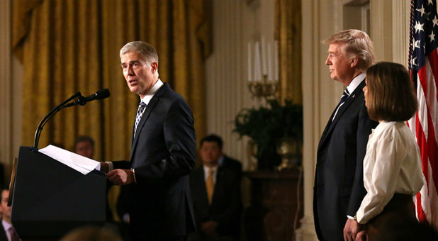 Judge Neil Gorsuch, left, speaks as President Donald Trump stands with Gorsuch's wife, Marie Louise, after Trump nominated Gorsuch to be an associate justice of the U.S. Supreme Court