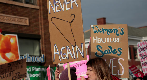 Supporters of Planned Parenthood rally outside a Planned Parenthood clinic in Detroit.