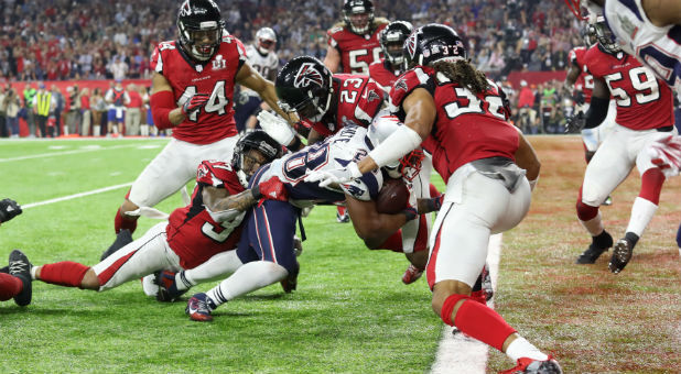 New England Patriots' James White scores a touchdown during overtime to win Super Bowl LI against the Atlanta Falcons.