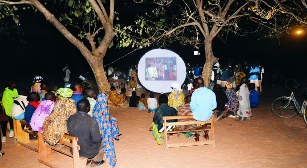 People watch the JESUS film in Zambia.