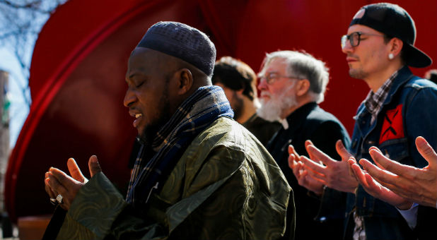 Muslim leaders lead a prayer action