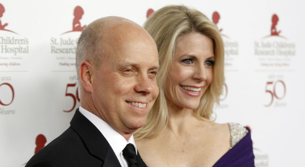 Former Olympic figure skater Scott Hamilton and his wife Tracie pose at the benefit gala for the 50th anniversary of St. Jude Children's Research Hospital in Beverly Hills
