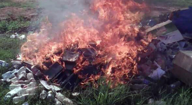 This image of Bibles reportedly being burned at Pastor Aloysius Bugingo's church has been circulating on social media.