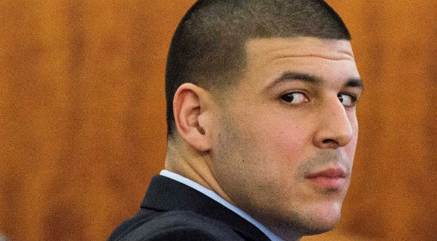 Aaron Hernandez looks at the gallery during his murder trial in Fall River, Massachusetts. The former New England Patriots football star hanged himself in the jail cell where he was serving a life sentence for murder.