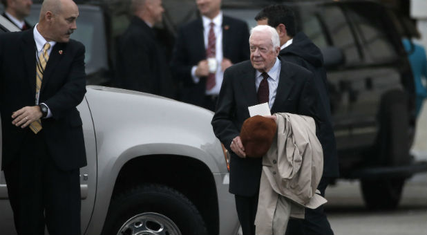 Former U.S. President Jimmy Carter departs the Capitol after attending the presidential inauguration of Donald Trump