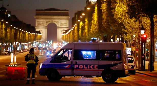 Police secure the Champs Elysees Avenue after one policeman was killed and another wounded in a shooting incident in Paris, France