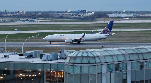 A United Airline Boeing 737-800 aircraft lands at O'Hare International Airport in Chicago, Illinois