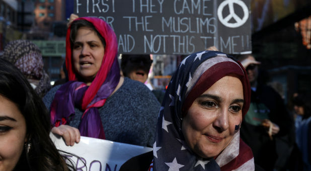 A woman wearing a U.S. flag hijab is pictured during an