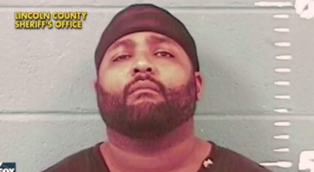 Willie Corey Godbolt, 35, was arrested and was being treated in a hospital for a gunshot wound, according to Warren Strain, a spokesman for the Mississippi Department of Public Safety.