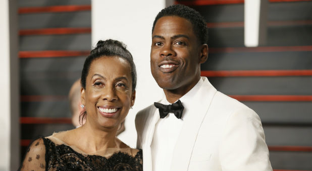 Actor Chris Rock and his mother, Rosalie Rock, arrive at the Vanity Fair Oscar Party.