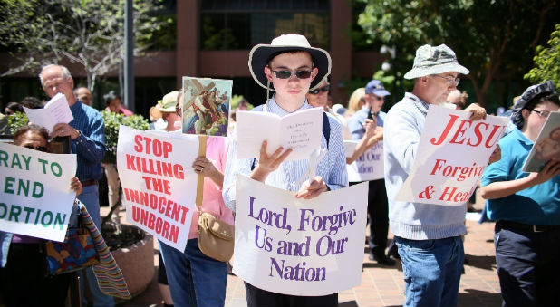 Protesters march in support of pro-life abortion legislation in front of the Federal Courthouse in San Diego, California