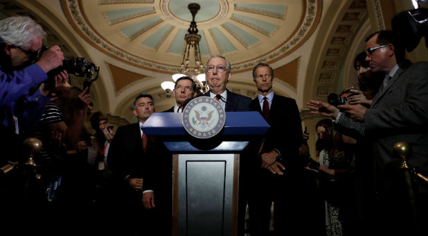 Senate Majority Leader Mitch McConnell, flanked by Sen. Cory Gardner, (R-CO), Sen. John Barrasso (R-WY) and Sen. John Thune (R-SD), speaks to reporters after the weekly policy luncheons on Capitol Hill in Washington, D.C.