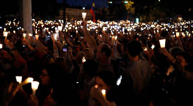 Pro-Democracy Demonstrators Holding Candlelight Vigil in Venezuela