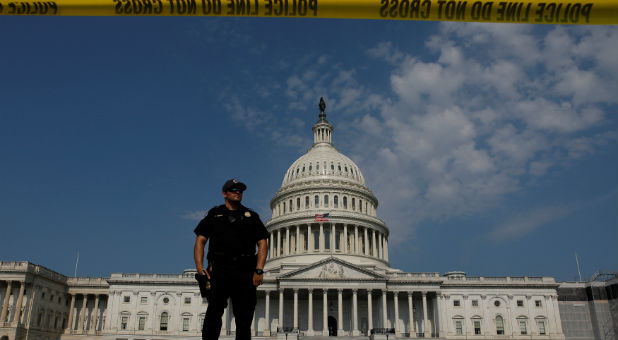 U.S. Capitol Police keep watch on Capitol Hill following a shooting in nearby Alexandria, in Washington.