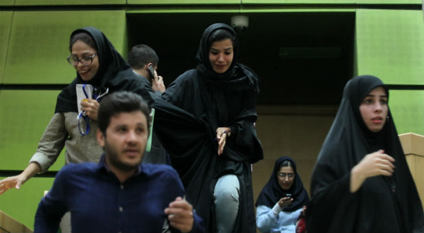 Women are seen inside the Parliament during an attack in central Tehran, Iran.
