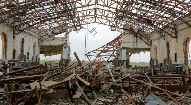 The remains of a destroyed church are seen in the town of Qaraqosh, south of Mosul, Iraq.