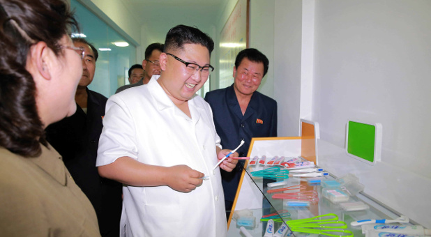 North Korean leader Kim Jong Un visits the newly-built Dental Sanitary Goods Factory.