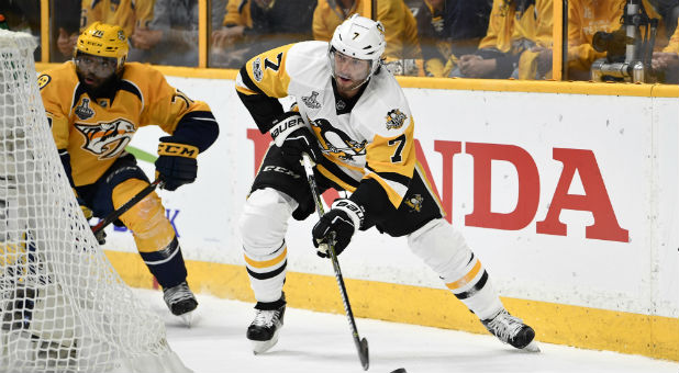 Pittsburgh Penguins center Matt Cullen (7) is defended by Nashville Predators defenseman P.K. Subban (76) during the first period in game three of the 2017 Stanley Cup Final at Bridgestone Arena.