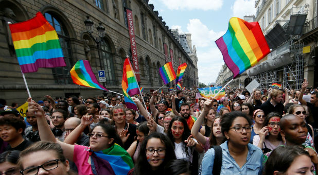 Participants take part in the annual Gay Pride parade in Paris, France.