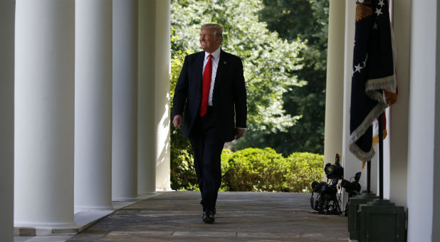 U.S. President Donald Trump arrives to announce his decision that the United States will withdraw from the landmark Paris Climate Agreement, in the Rose Garden of the White House.