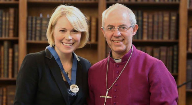 Vicky photographed with Archbishop Justin Welby, receiving the Thomas Cranmer Award for contributions to worship, June 2017, Lambeth Palace, London.
