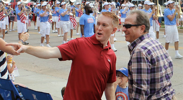 U.S. Sen. James Lankford, R-Okla., visits with constituents during the LibertyFest parade on the Fourth of July in Edmond, Oklahoma, north of Oklahoma City.