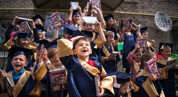 Children from Chervonograd, Ukraine celebrate their graduation from The Greatest Journey.