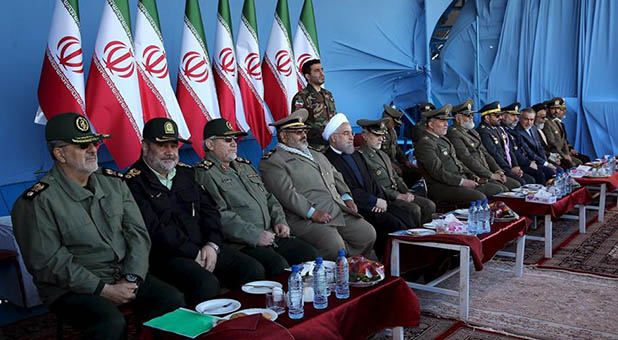 Iranian President Hassan Rouhani and military leaders