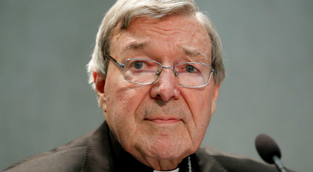 Cardinal George Pell attends news conference at the Vatican.