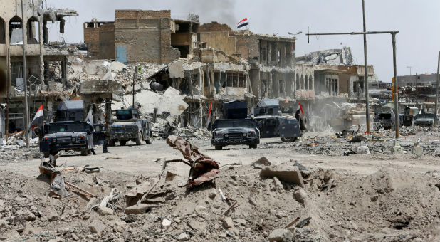Vehicles of the federal police are seen during the fight with the Islamic States militants in the Old City of Mosul, Iraq, July 3, 2017.