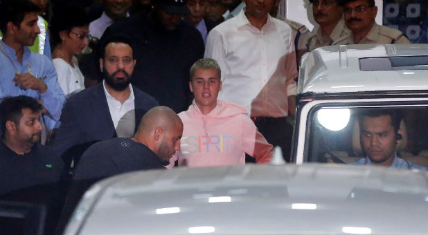 Canadian singer Justin Bieber leaves the airport terminal after arriving in Mumbai, India, May 10, 2017.