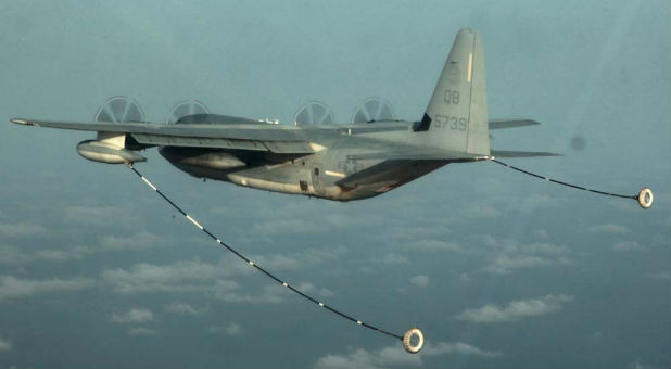 A KC-130 Hercules with Marine Medium Helicopter