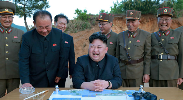 North Korean leader Kim Jong Un reacts during the long-range strategic ballistic rocket Hwasong-12 (Mars-12) test launch in this undated photo released by North Korea's Korean Central News Agency (KCNA) on May 15, 2017.