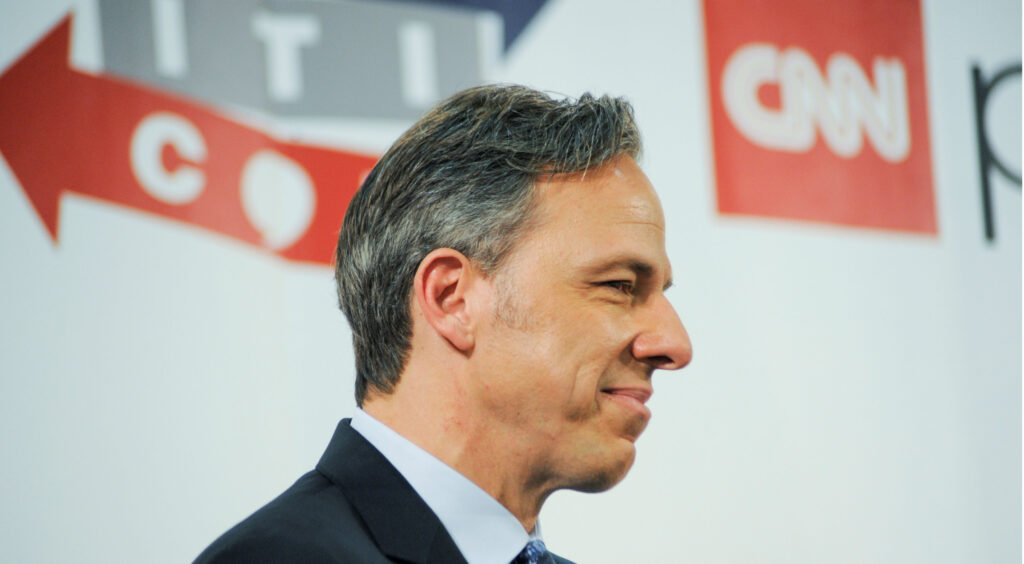 CNN anchor Jake Tapper appears on stage at Politicon,