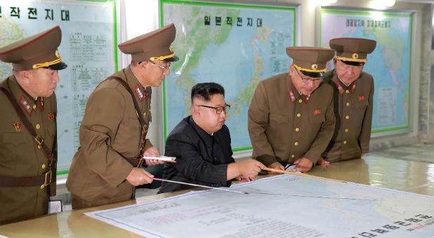 North Korean leader Kim Jong Un inspected the Command of the Strategic Force of the Korean People's Army (KPA) in an unknown location in North Korea in this undated photo released by North Korea's Korean Central News Agency (KCNA) on August 15, 2017.