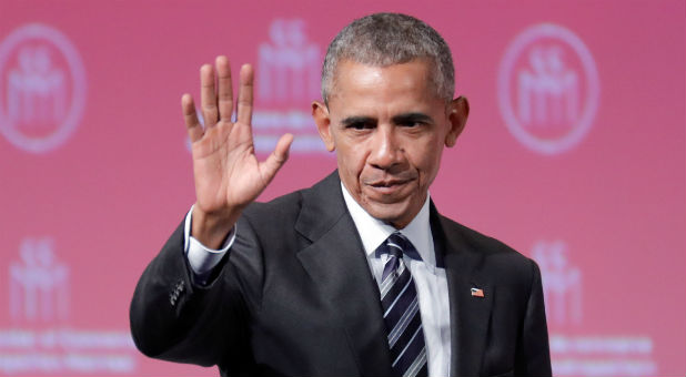 Former U.S. President Barack Obama waves after his keynote speech to the Montreal Chamber of Commerce,