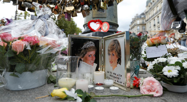 A small memorial at the location where Princess Diana was in a fatal car wreck.