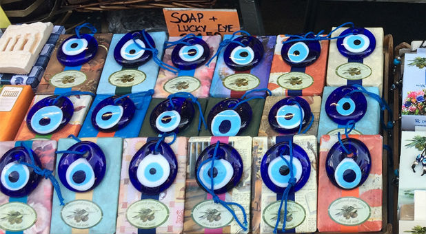 Soaps sold with nazars, charms used to ward off the evil eye, at the Monastiraki market in Athens, Greece.